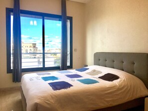 Deluxe Apartment, 3 Bedrooms, City View | 1 bedroom, premium bedding, in-room safe, iron/ironing board