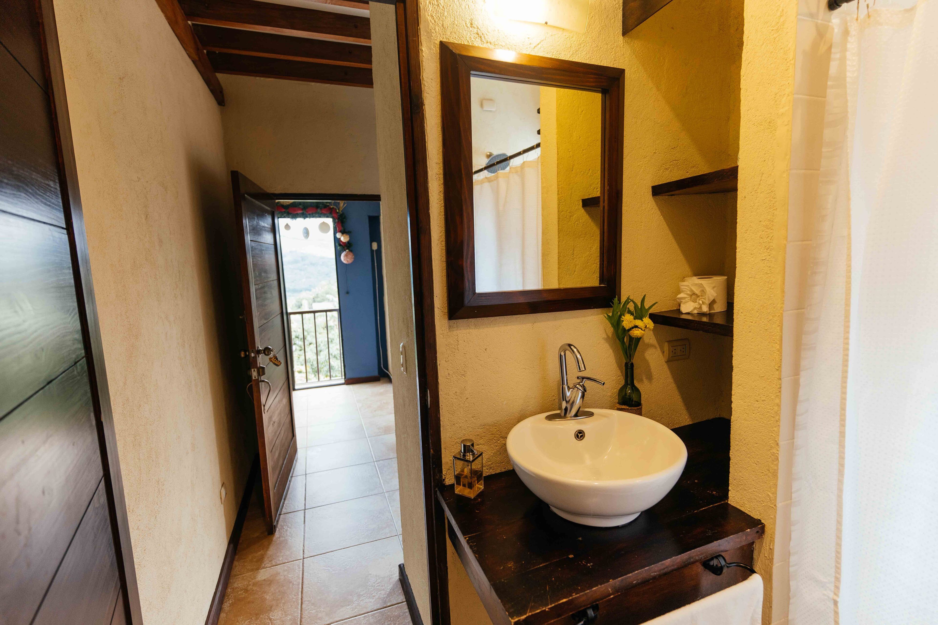 shower, rainfall showerhead, hair dryer, towels