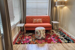 Sunrise Suite - Room 16 | Living area | Flat-screen TV, iPad