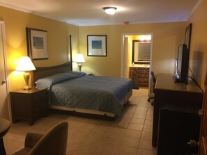 Deluxe Suite, 1 King Bed, Kitchen | 1 bedroom, desk, iron/ironing board, free WiFi