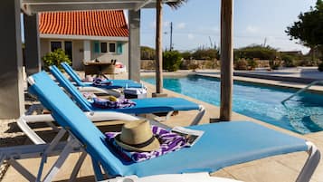 Outdoor pool, pool umbrellas, sun loungers