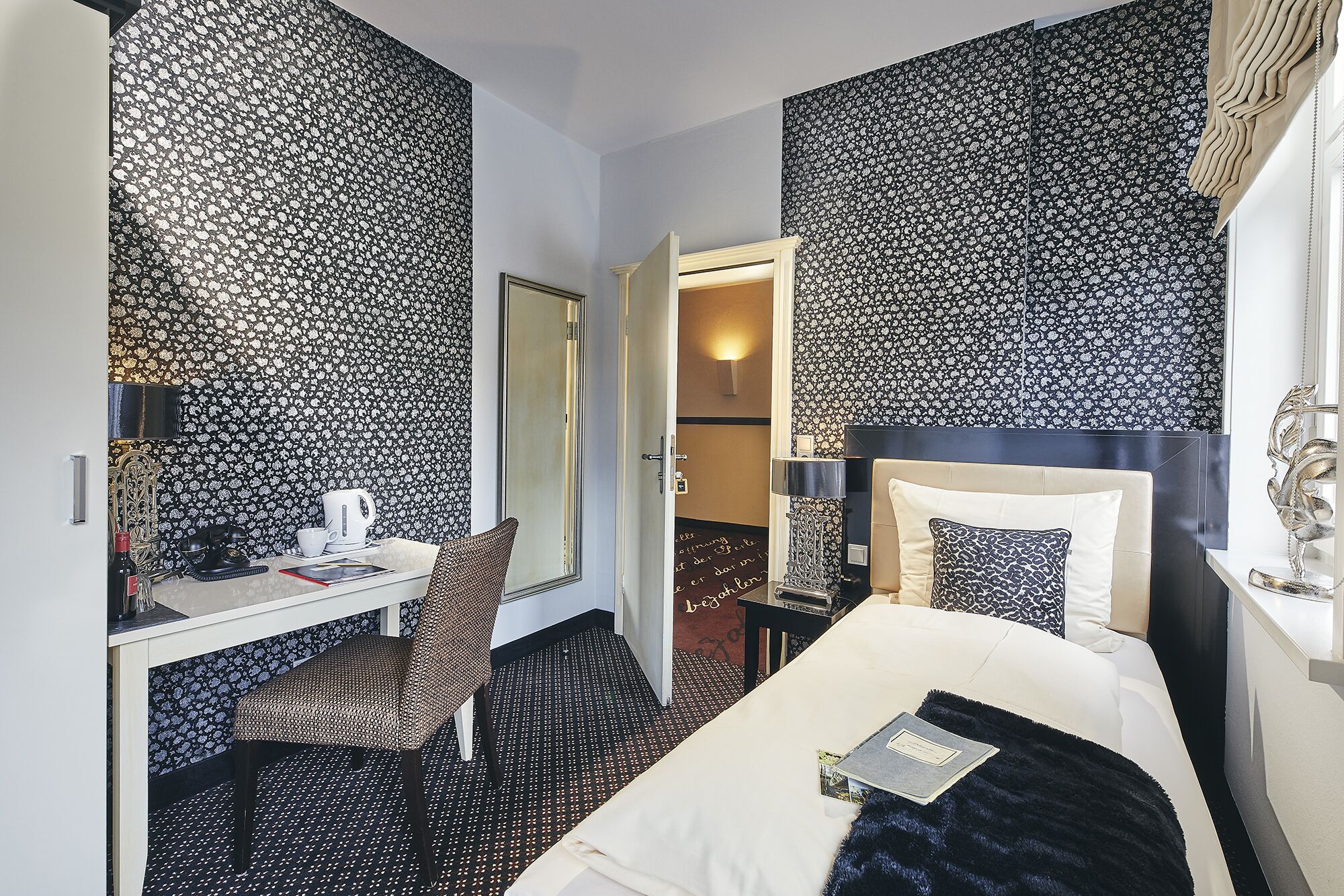 standard double room | living area | flat-screen tv