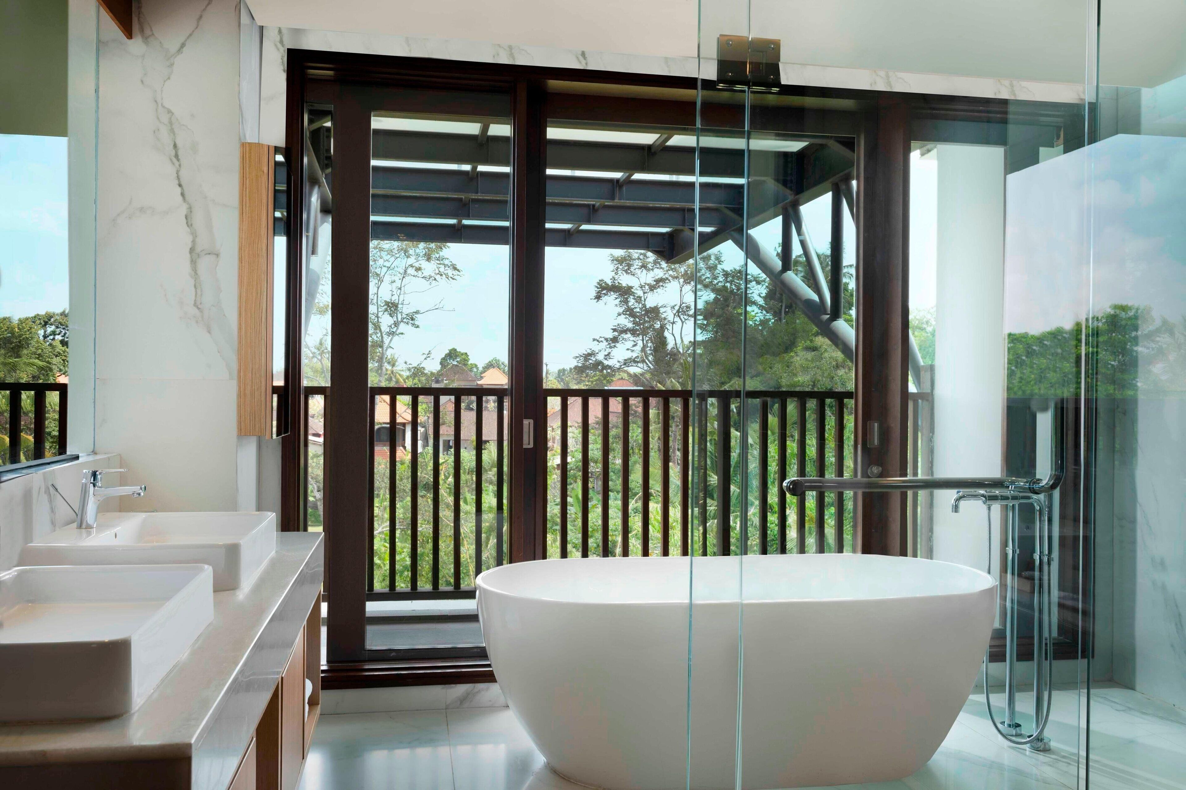 suite, 1 bedroom, balcony, garden view | bathroom | designer toiletries, hair dryer, bathrobes, slippers