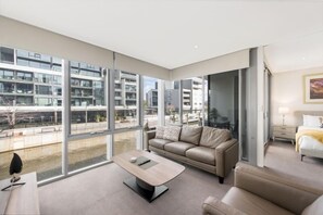 Luxury Apartment | Living area | LCD TV, DVD player - Accommodate Canberra - Lakefront (Kingston)