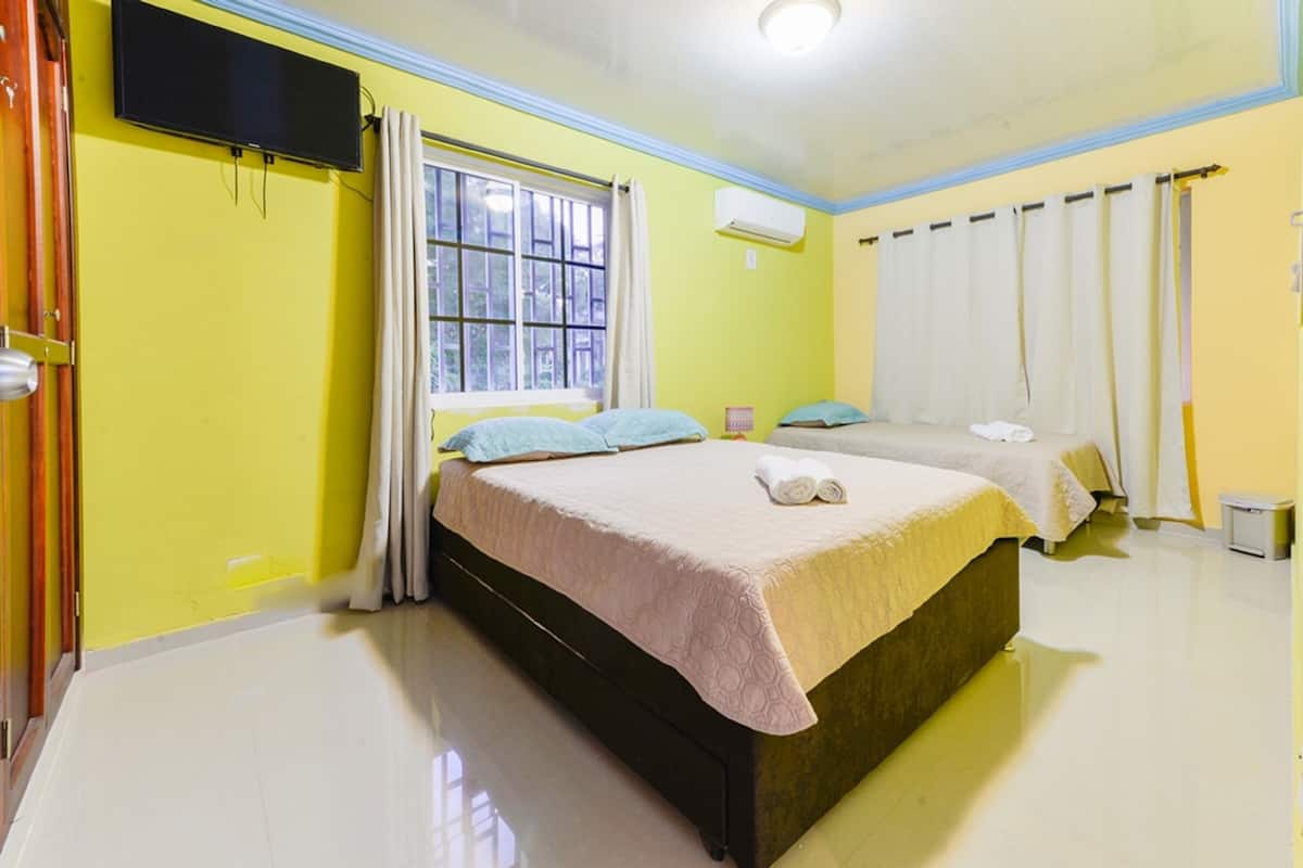 Family Room, Multiple Beds | Iron/ironing board, free WiFi, bed sheets, wheelchair access