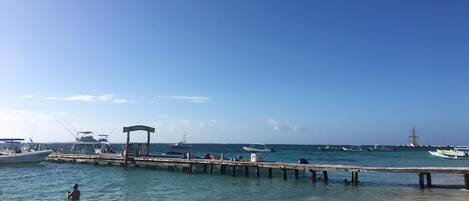 Beach nearby, white sand, sun loungers, beach umbrellas