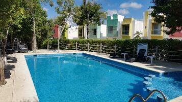 Outdoor pool, open 6 AM to 9 PM, pool umbrellas, sun loungers