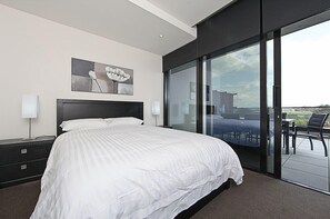 Apartment, 1 Bedroom (The ApARTments 403) | Iron/ironing board, bed sheets