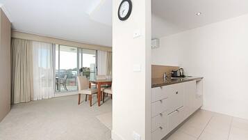 Apartment, 1 Bedroom (The Avenue 62) | Private kitchen | Full-sized fridge, microwave, oven, stovetop
