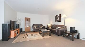 Apartment, 1 Bedroom (The Avenue 93) | Living room | LCD TV, DVD player