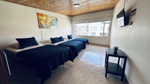 Standard Quadruple Room | Free WiFi, bed sheets - Hotel Paipa Inn (Paipa)