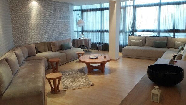 Apartment, 2 Bedrooms | Living room | 40-inch flat-screen TV with satellite channels, TV - The Horizon Sea View (Casablanca)