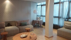 Apartment, 2 Bedrooms | Living room | 40-inch flat-screen TV with satellite channels, TV - The Horizon Sea View (Casablanca)