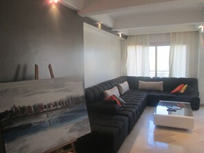 Apartment, 2 Bedrooms | Living room | 40-inch flat-screen TV with satellite channels, TV