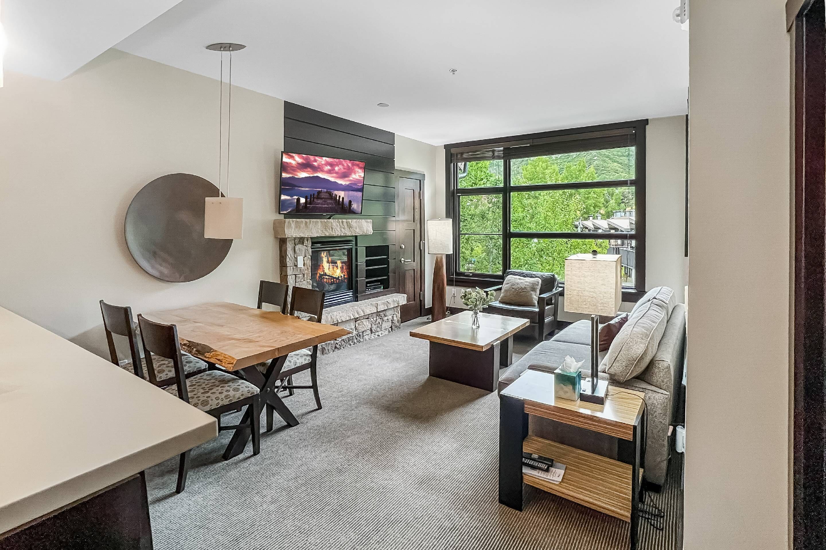 Enjoy year round views in the bright living room with big windows