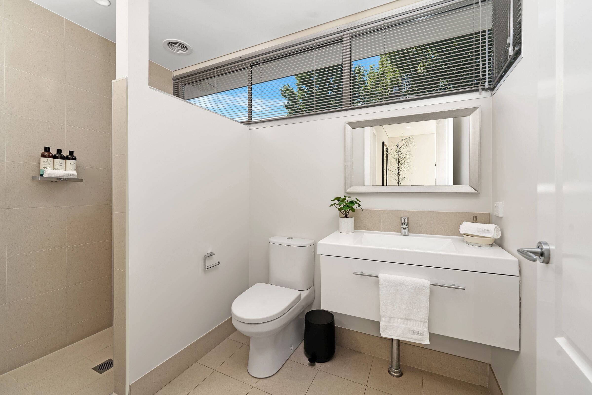 Shower, hair dryer, bathrobes, towels