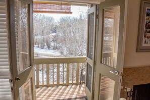 Step out onto the balcony and take in the breathtaking view of the snowy landscape.