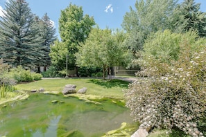 Stroll through the serene garden, surrounded by lush greenery and mature trees, and discover a tranquil oasis.