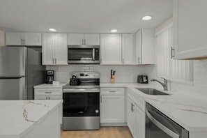 Fridge, microwave, coffee/tea maker, toaster