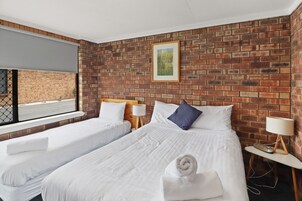 Apartment, 1 Bedroom | Iron/ironing board, free cribs/infant beds, free WiFi, bed sheets