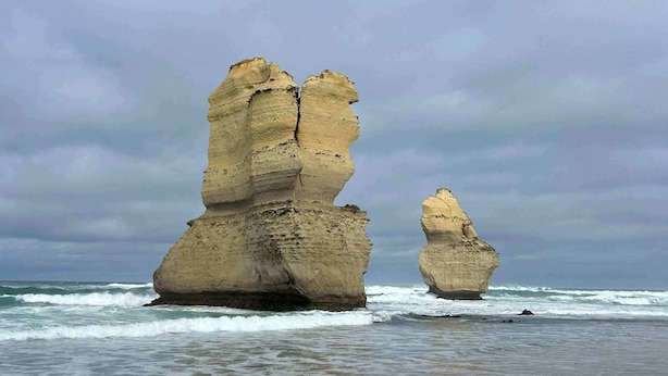 A coastal landscape with rock formations and a beach. - House on the hill with Spectacular Port Bay Views (Port Campbell)