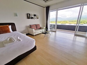 Habitación Deluxe, 2 camas individuales, vistas a la montaña | Cortinas opacas, camas supletorias, wifi gratis