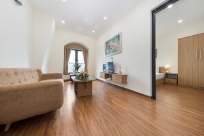 Apartment, 2 Bedrooms | Desk, blackout drapes, soundproofing, iron/ironing board