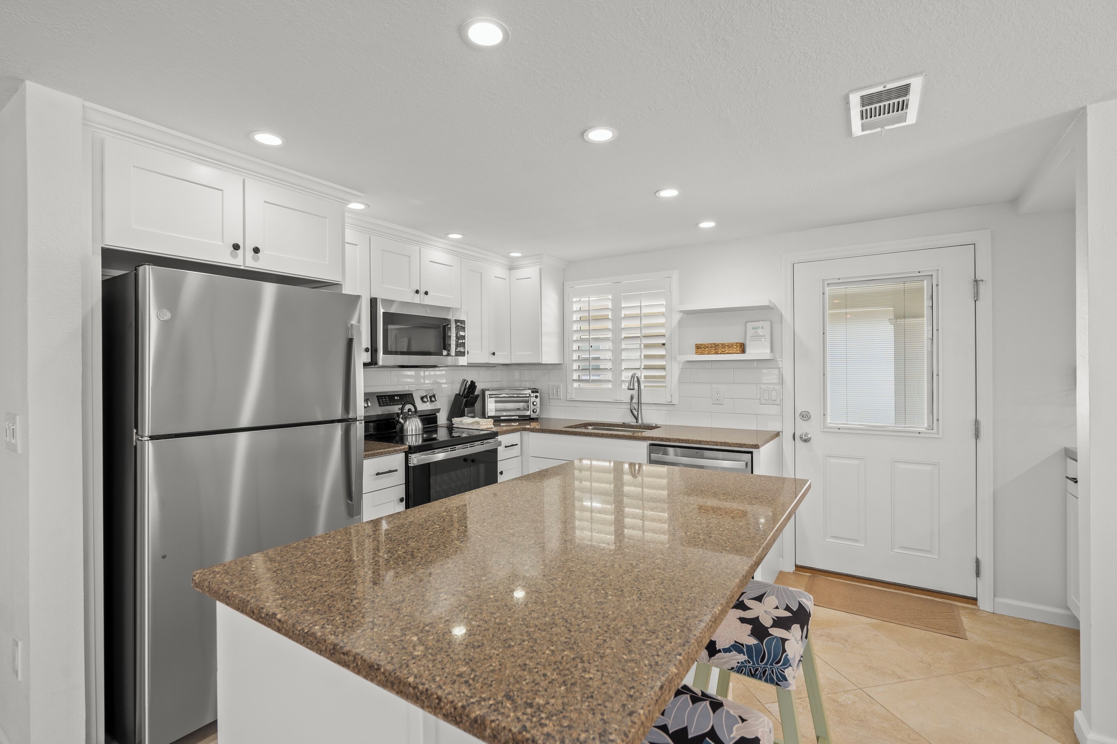 Fridge, microwave, coffee/tea maker, toaster