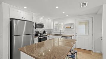 Fridge, microwave, coffee/tea maker, toaster