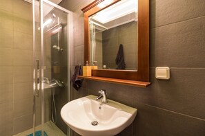 Shower, hair dryer, soap, shampoo