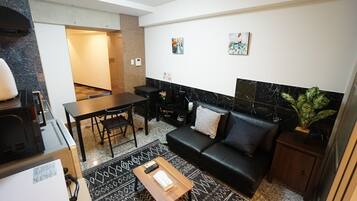 Apartamento | Área de estar | TV de tela plana