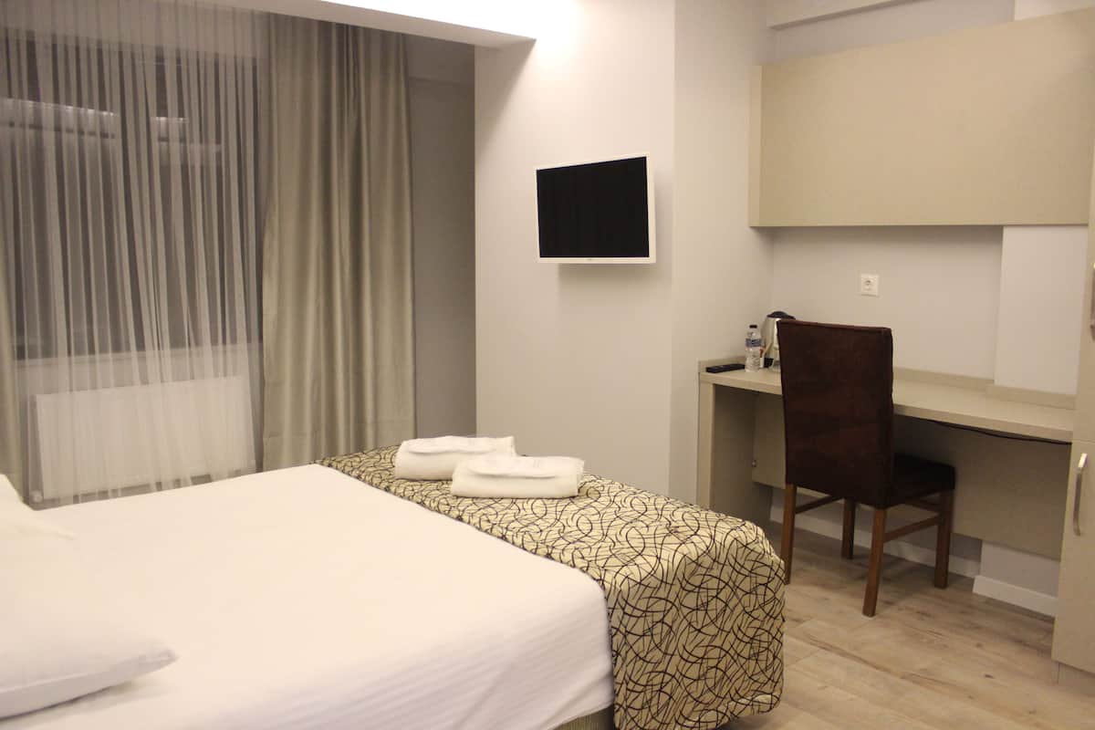 1 habitación, minibar, escritorio y espacio para trabajar con laptop