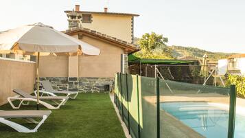 Seasonal outdoor pool, pool umbrellas, pool loungers