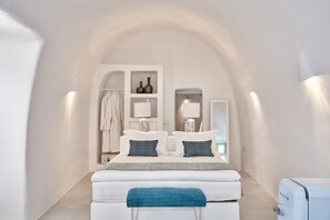 Honeymoon Suite, Hot Tub, Sea View (Executive) | Minibar, in-room safe, soundproofing, iron/ironing board - Limestone (Santorini)