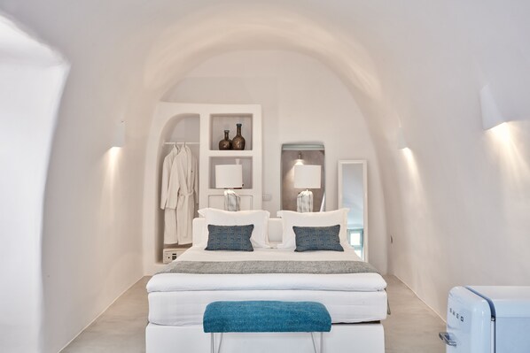 Honeymoon Suite, Hot Tub, Sea View (Executive) | Minibar, in-room safe, soundproofing, iron/ironing board - Limestone (Santorini)