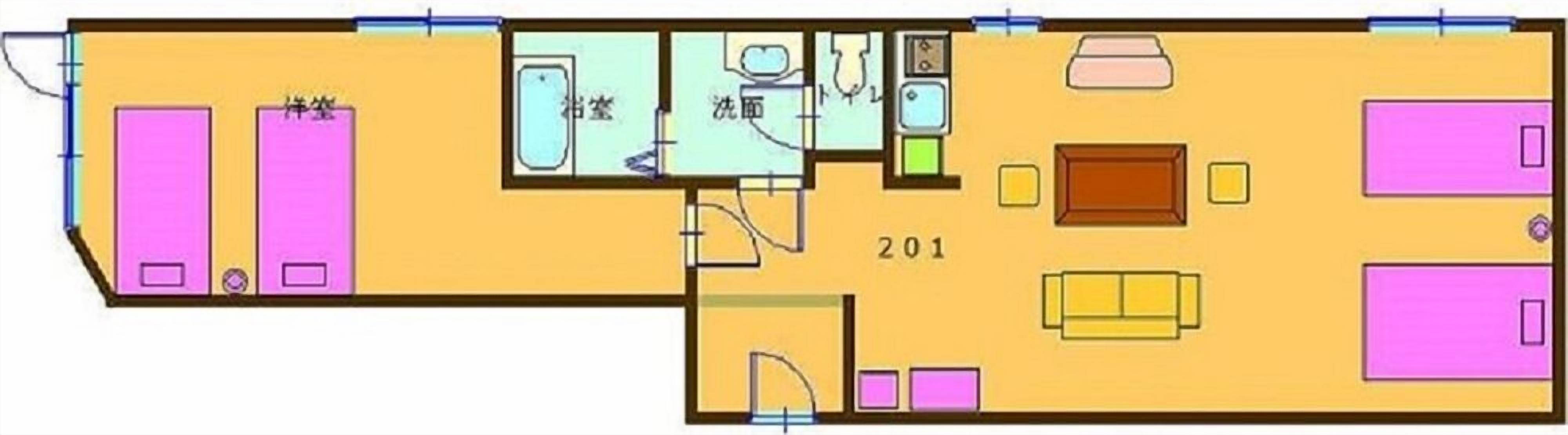 A floor plan with two bedrooms, a bathroom, a kitchen, and a living area.