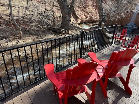 Property grounds. Charming Creekside Cabin Walk to Downtown Manitou – Ideal Retreat!