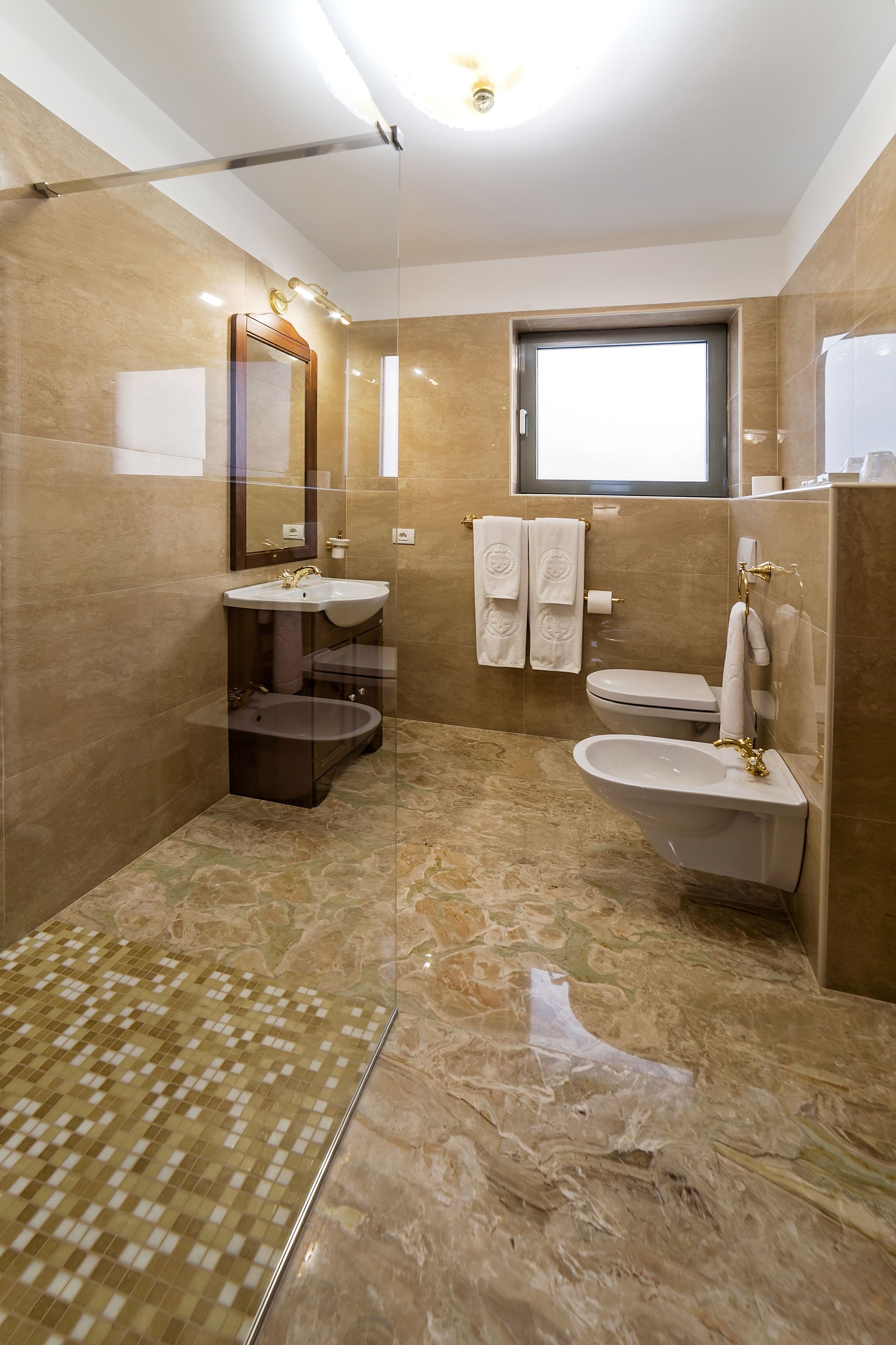 villa | bathroom | shower, rainfall showerhead, free toiletries, hair dryer
