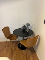 Deluxe Studio | Living area | Flat-screen TV