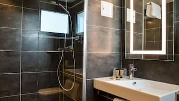 Shower, free toiletries, hair dryer, towels