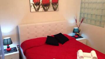 Suite Deluxe | Biancheria da letto di alta qualità, minibar, ferro/asse da stiro