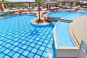 Indoor pool, seasonal outdoor pool, pool umbrellas, pool loungers