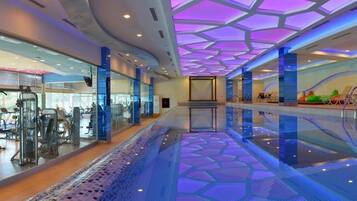 Indoor pool, seasonal outdoor pool, pool umbrellas, sun loungers