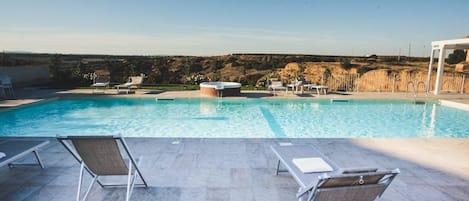 Outdoor pool, sun loungers