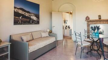 Deluxe Suite | Living area | LED TV