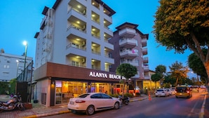 A multi-story hotel with balconies and a beach-themed facade. - Alanya Beach Hotel (Alanya)