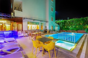 Outdoor pool, pool umbrellas, pool loungers