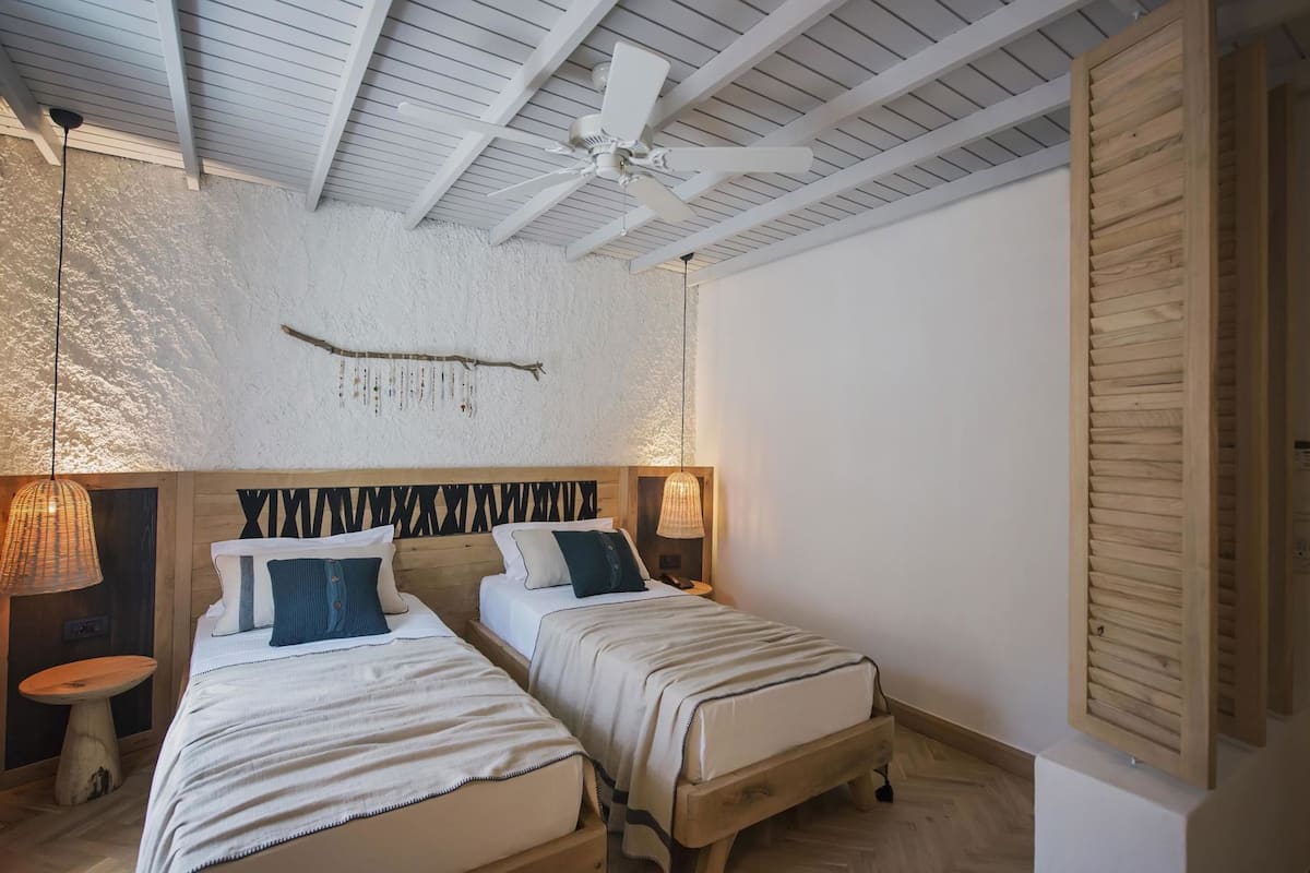 Egyptian cotton sheets, premium bedding, Tempur-Pedic beds, minibar