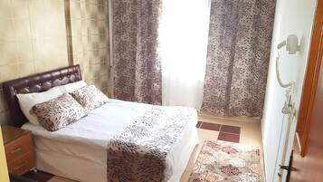 Chambre Simple Confort | Draps en coton égyptien, literie de qualité supérieure