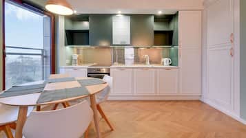 Luxury Apartment, 1 Bedroom, Balcony, Beachfront | Private kitchen | Fridge, microwave, oven, stovetop